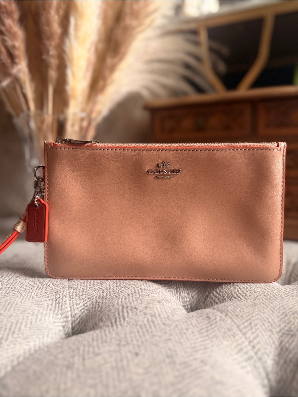 Coach Peach Leather Wristlet with Coral Tag